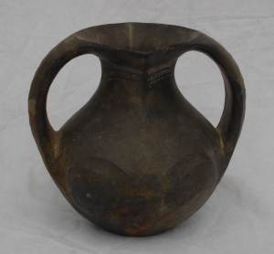 Sichuan blackware, spiral relief decoration probably representing eyes - courtesy Glade Antiques